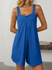 Royal blue pleated bodice romper with wide straps and pockets.