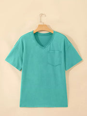 Teal mineral wash cotton v-neck t-shirt with chest pocket and raw hem detail.
