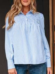 Blue and white striped button-down shirt with shirred yoke and collar.