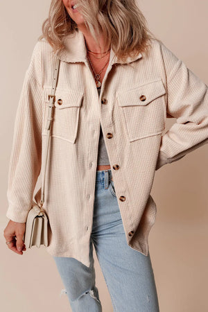 Beige corduroy oversized utility jacket with button front and chest pockets