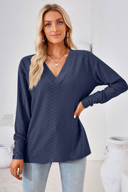 Dark Blue textured V-neck blouse with button cuff long sleeves