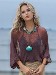 Mauve textured knit batwing cover-up with sheer sleeves and a relaxed fit.