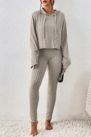 Beige ribbed knit cropped hoodie and leggings lounge set with drawstring hood.