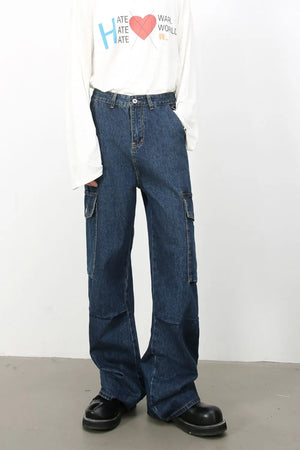 Denim palazzo cargo pants in dark blue with baggy fit and multiple pockets.