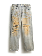 Men's light wash distressed cotton jeans with unique yellow wash and ripped details.