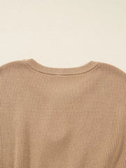Ribbed knit sweater dress in tan with a crew neck and keyhole detail.