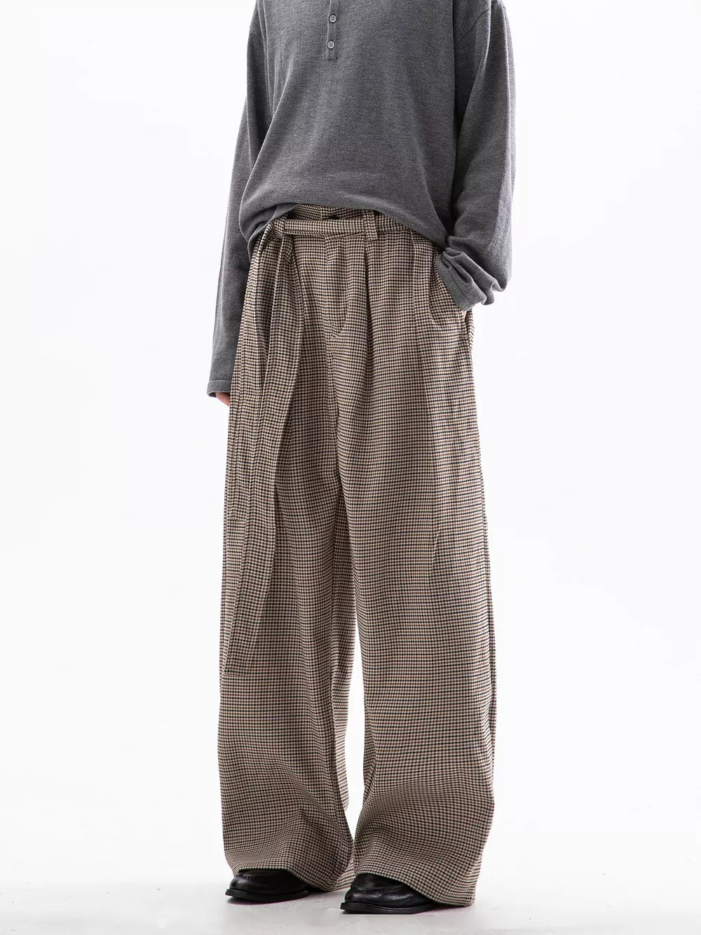 Men's wide leg check trousers in beige and brown with a tie waist.