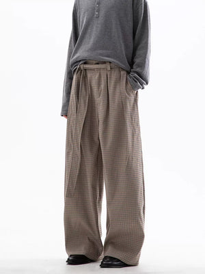 Men's wide leg check trousers in beige and brown with a tie waist.