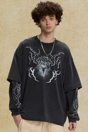 Black layered graphic sweatshirt with distressed finish and tribal sleeve details.