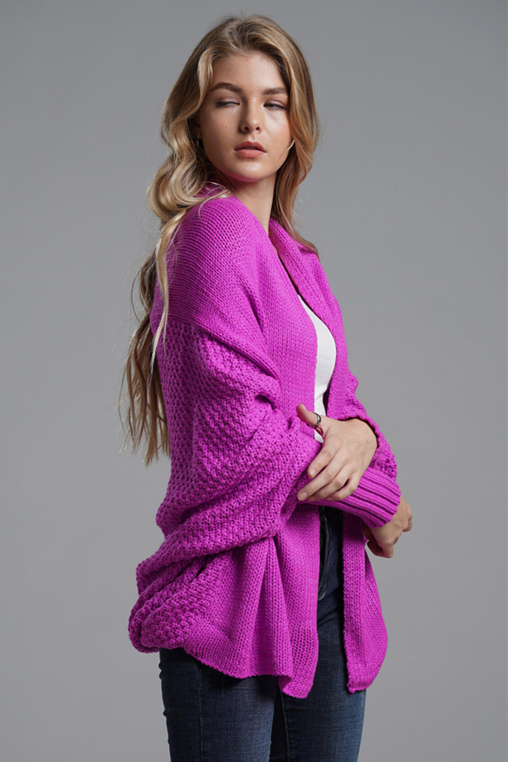 Cocoon knit sleeve cardigan in Vivid Violet acrylic with textured sleeves and open front.