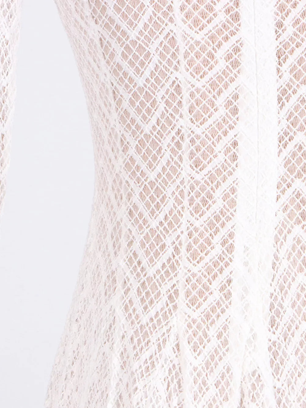 White lace maxi dress with mock neck and long sleeves, showing intricate diamond pattern.
