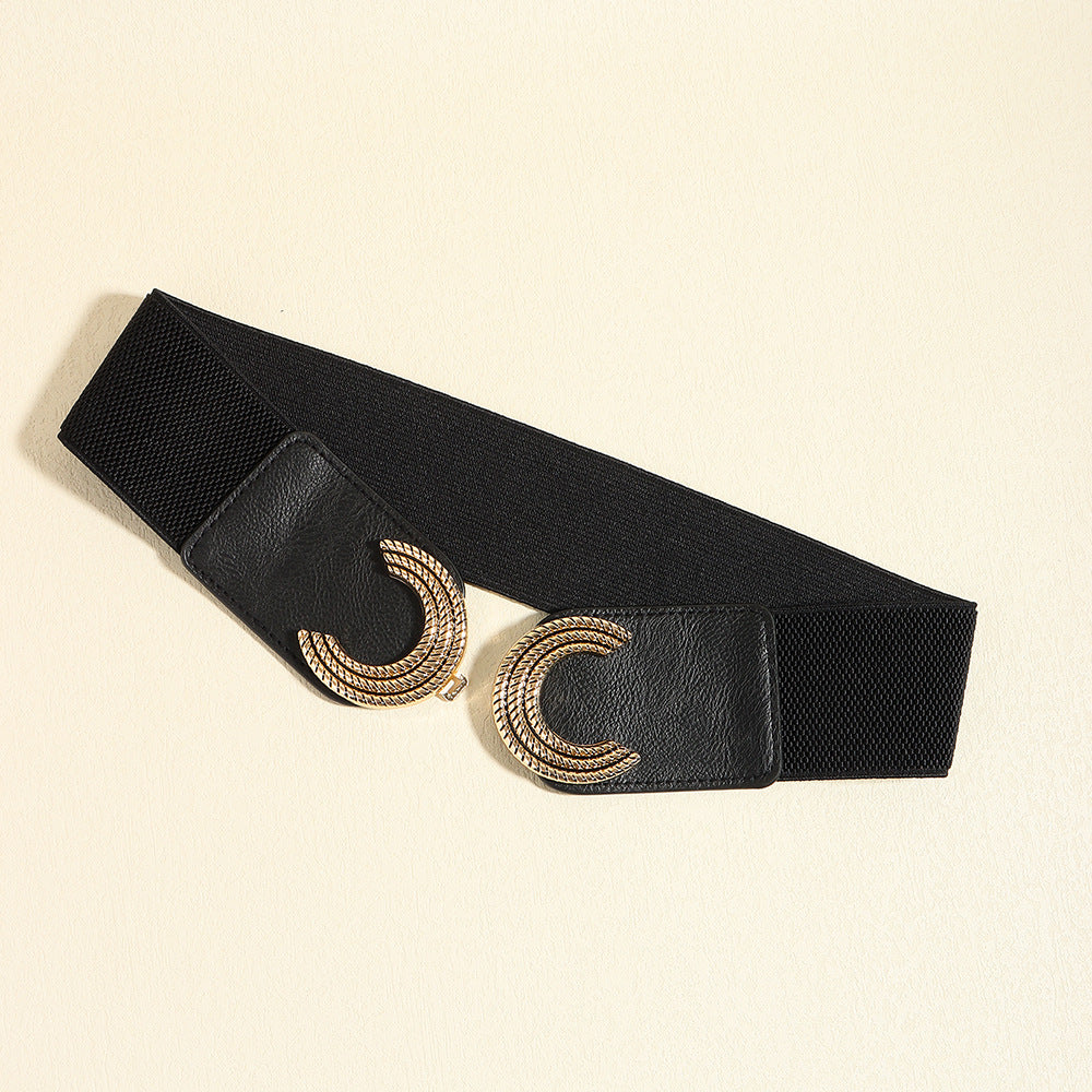Black stretch belt with double C gold buckle detail