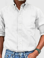 White Oxford button-down shirt with a relaxed fit and button-down collar.