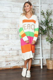 Beige knit midi sweater dress with rainbow stripes and PEACE lettering, V-neck, long sleeves.