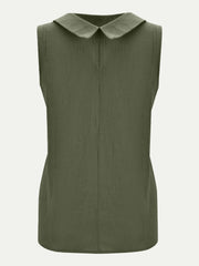 Moss green sleeveless blouse with Peter Pan collar and textured fabric.
