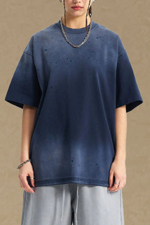 Navy oversized t-shirt with paint splatter detail and crew neck.