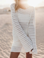 White crochet dress with bell sleeves and open back detail