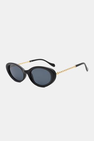 Black oval cat-eye sunglasses with gold chain detail on temples