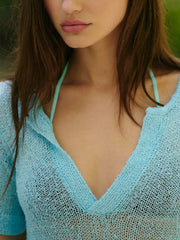 Sky blue knit blouse with V-neck and sheer texture