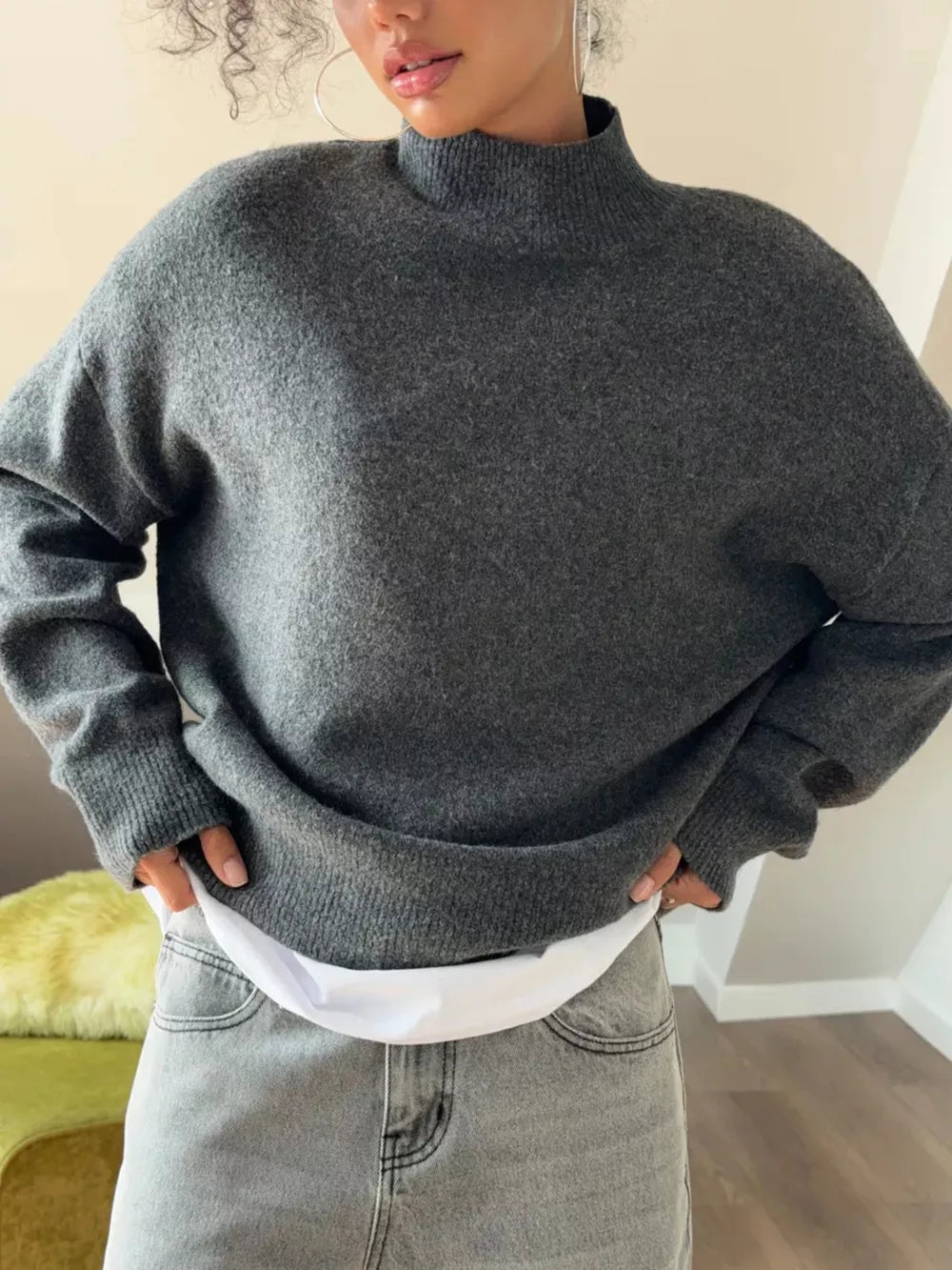 Dark Gray Relaxed Mock Neck Knit Sweater with a soft acrylic blend texture.
