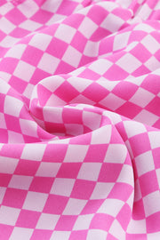 Pink and white checkered shorts with a scalloped hem detail