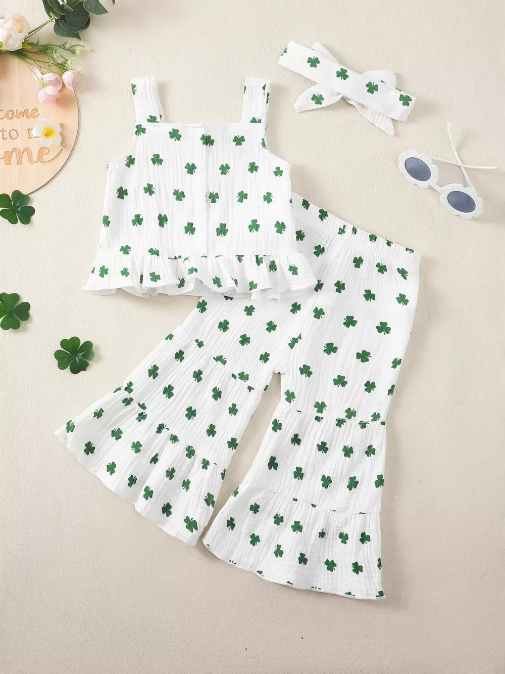 Baby shamrock ruffle set with tank top and bell bottoms, includes headband.