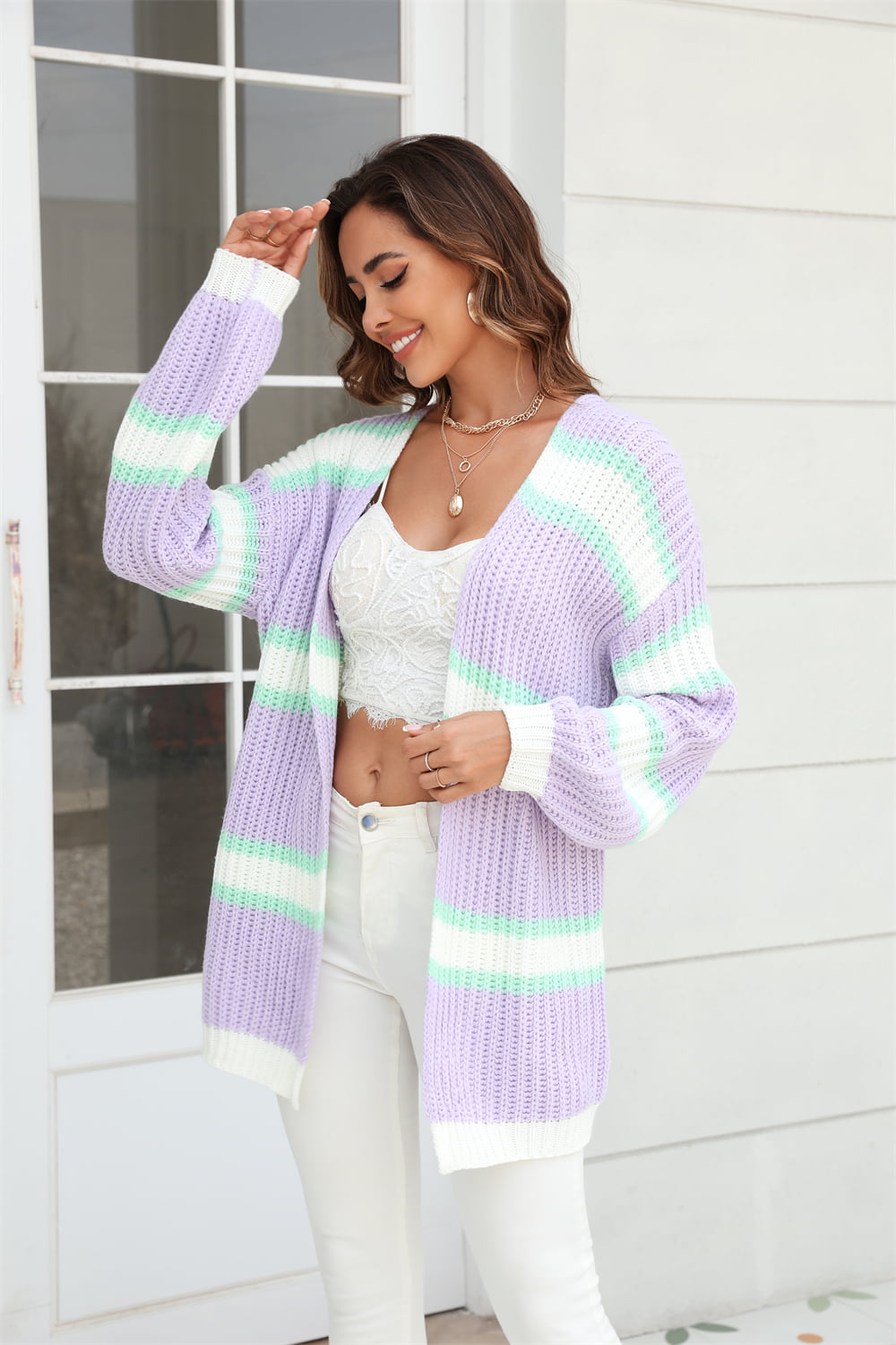 Open knit cocoon cardigan with rainbow stripes in lavender, mint green, and white acrylic.