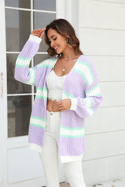 Open knit cocoon cardigan with rainbow stripes in lavender, mint green, and white acrylic.