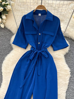 Blue belted wide-leg maternity jumpsuit with pockets and button front