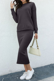 Dark Gray ribbed knit midi co-ord set with crew neck sweater and fitted skirt.