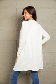 White long sleeve maxi cardigan with a relaxed fit