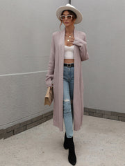 Long textured knit maxi cardigan in purple with open front and long sleeves.