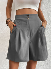 Dark Gray pleated front bermuda shorts with button closure and pockets.