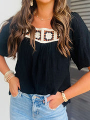 Black gauze blouse with crochet yoke and puff sleeves