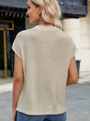 Tan knit cap sleeve top with vertical seam detail.