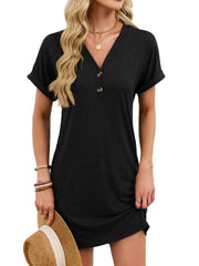 Black v-neck t-shirt dress with decorative buttons and cuffed sleeves.