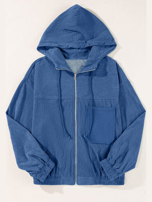 Dusty Blue corduroy relaxed fit zip-up hoodie with drawstring hood and front pocket.