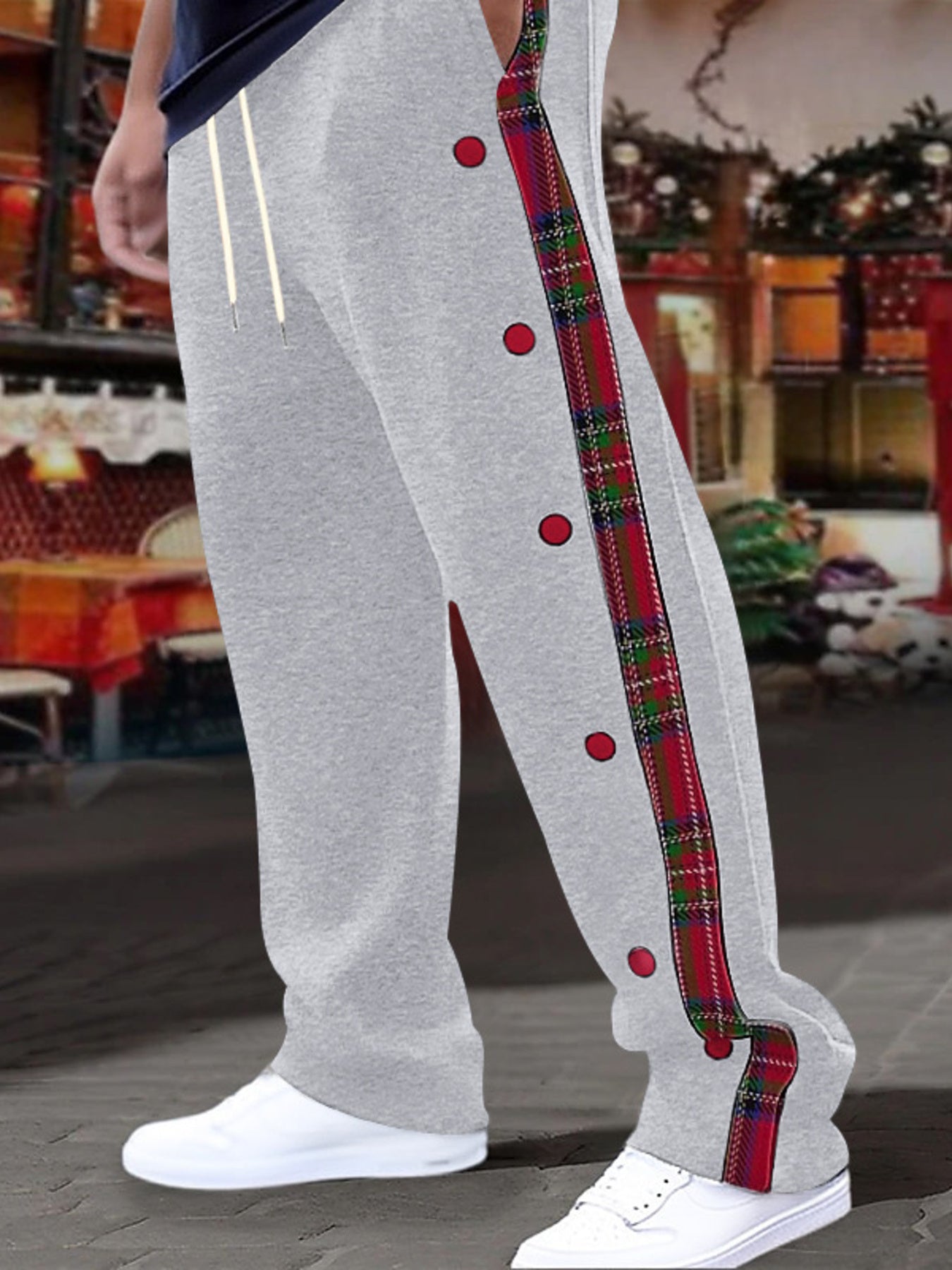 Light gray men's sweatpants with red plaid snap-button trim and drawstring waist.