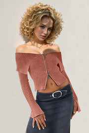 Off-shoulder ribbed top in pink with flare sleeves and a zip front.