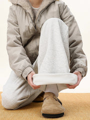 Men's gray wide-leg sweatpants with leopard trim detail, cuffed hem.
