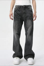 Washed black wide-leg denim jeans with a relaxed fit and distressed detailing.