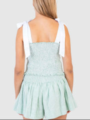 Light green smocked bodice and skirt set with white tie straps and pinstripe detail.
