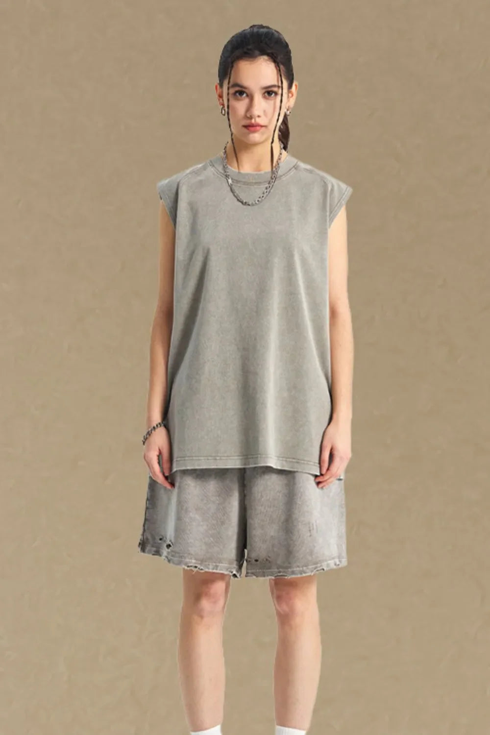 Acid wash relaxed fit tank top in dark gray with a crew neck and sleeveless design.