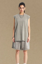 Acid wash relaxed fit tank top in dark gray with a crew neck and sleeveless design.