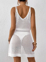 White openwork V-neck cover-up dress with crochet detail and spaghetti straps.