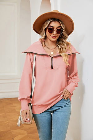 Peach wide collar zip-through sweatshirt with a relaxed fit.