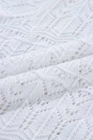 White openwork crochet cardigan with a diamond pattern and breathable acrylic knit.
