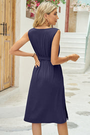 Dark blue belted sleeveless midi dress with slit hem and round neckline
