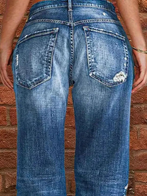 Maternity jeans in blue denim with distressed details and raw hem