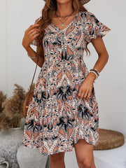 Paisley print mini dress with flutter sleeves and V-neck in cream/orange.